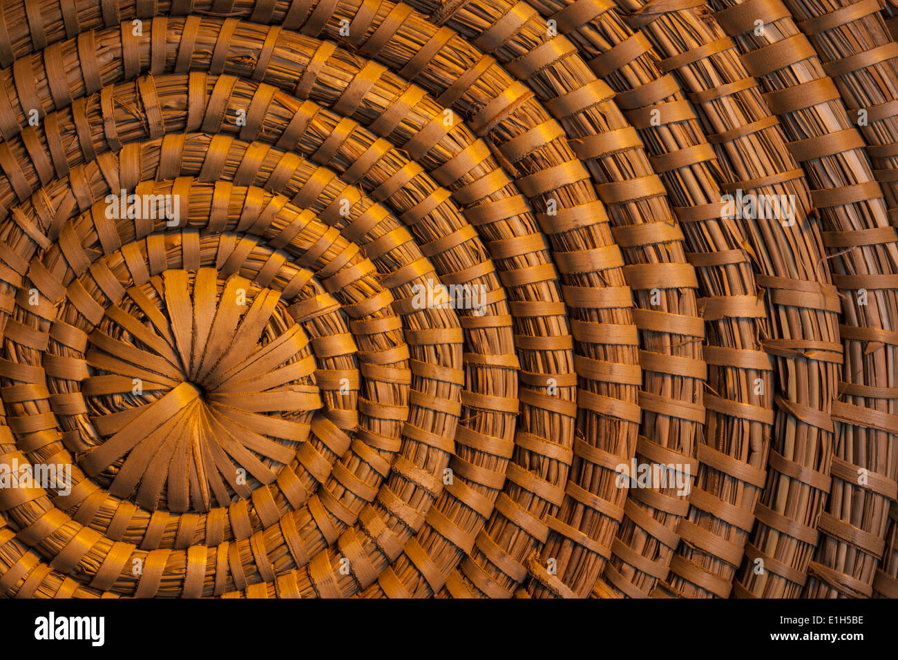 Background - Rattan woven into a Spiral Pattern Stock Photo
