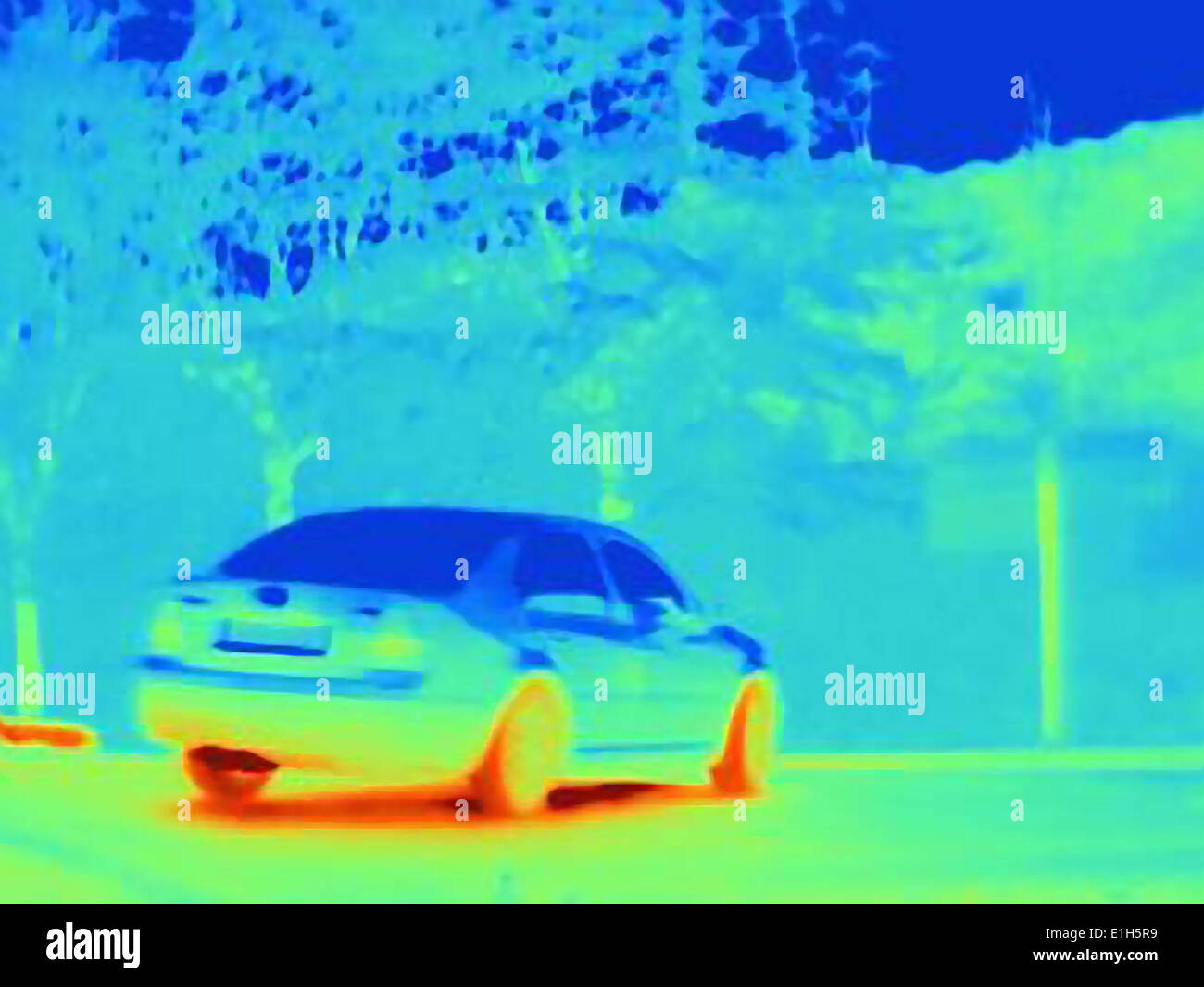 Thermal image which reveals the heat of the tyres and exhaust of a