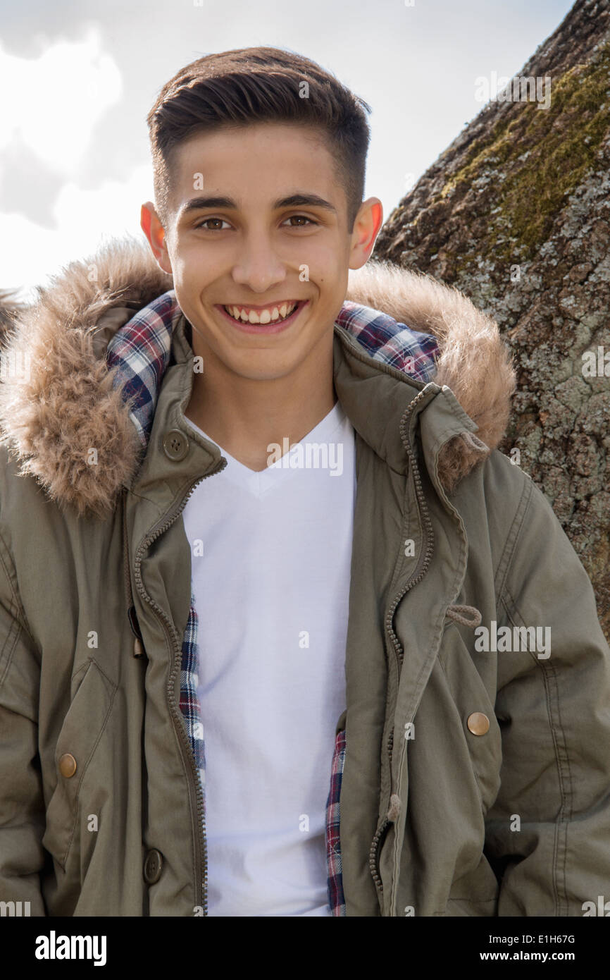 Portrait of teenage boy in parka jacket Stock Photo