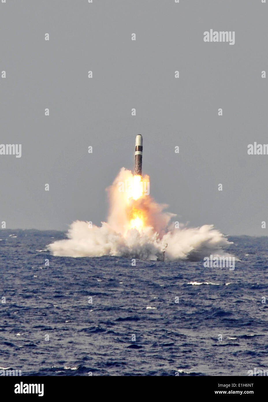 A US Navy trident II D-5 ballistic missile is ocean launched from the Ohio-class ballistic missile submarine USS West Virginia during a missile test June 2, 2014 at the Atlantic Missile Range. Stock Photo