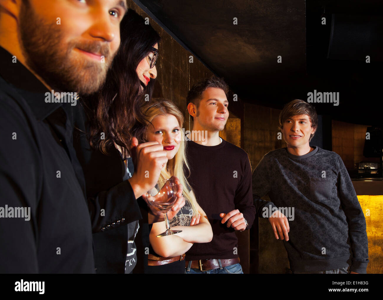 Group of friends in nightclub Stock Photo