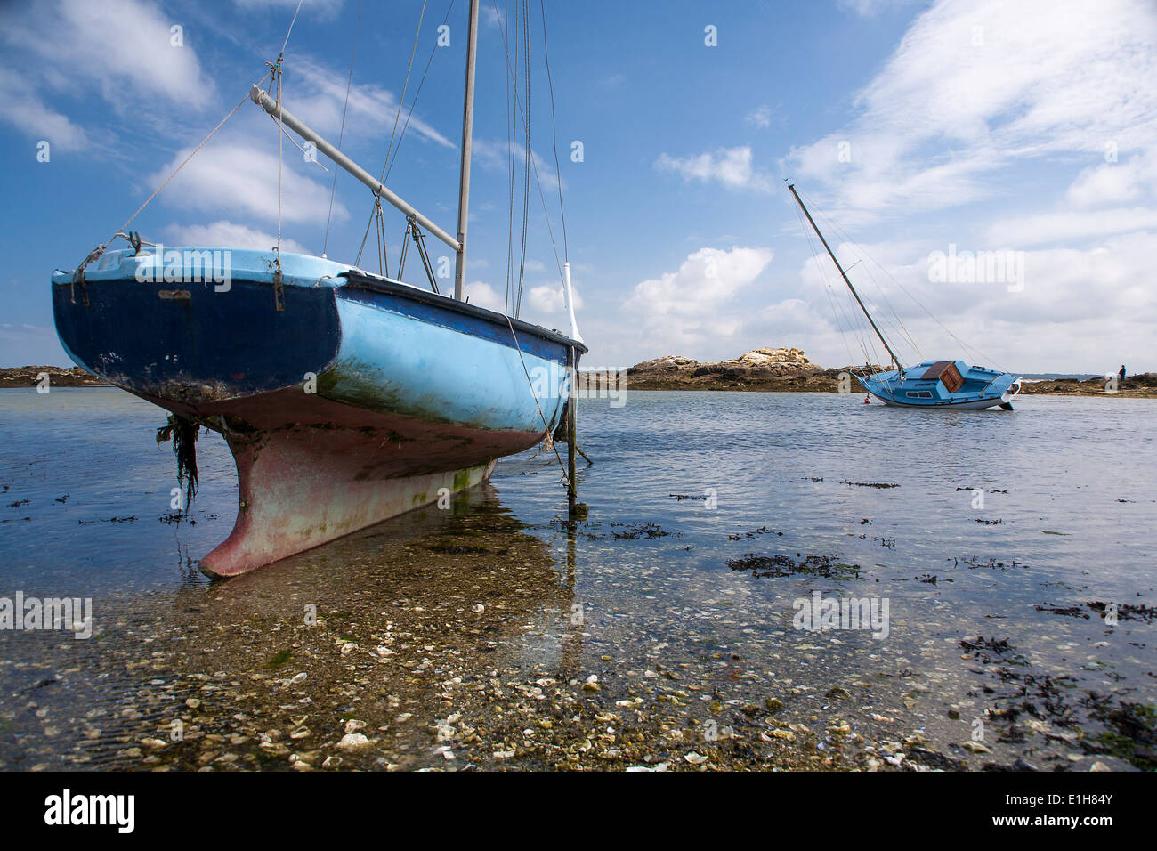 Yachts at low tide on the Cote Sauvage, Brittany, France. Stock Photo