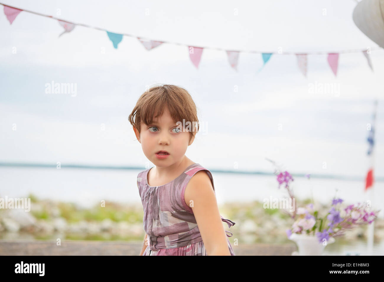 Candid portrait of young girl at party Stock Photo