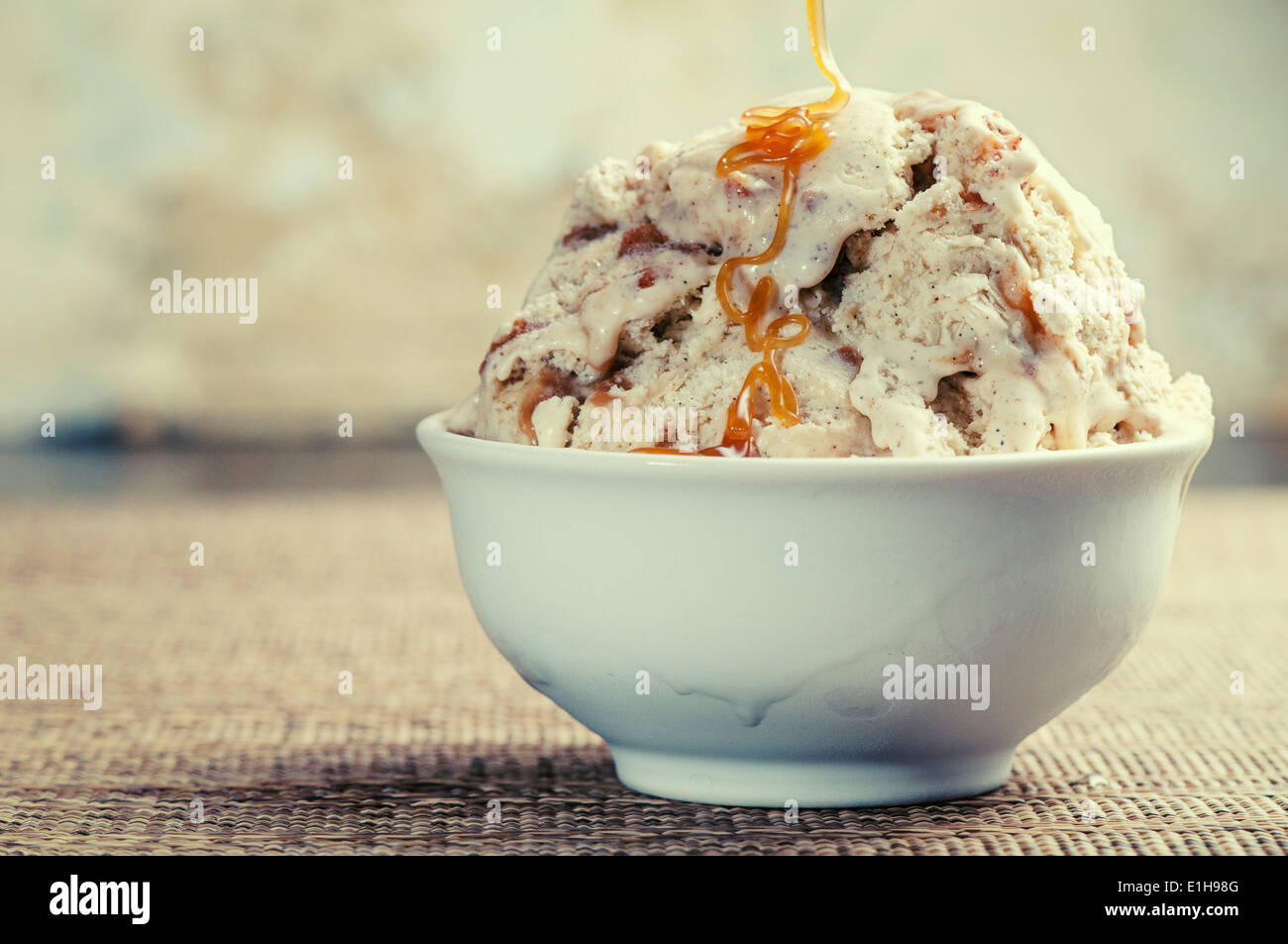 Cinnamon Vanilla Ice Cream with Caramel Sauce Stock Photo Alamy