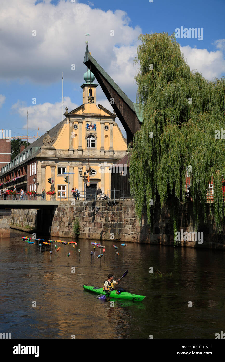 Canoe at river Ilmenau in the old harbour at Stintmarkt, Lueneburg ...
