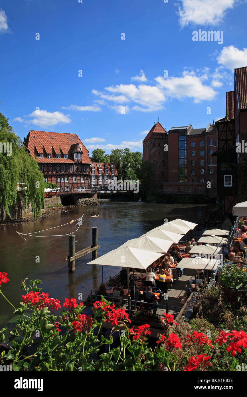 Restaurant and cafe at river Ilmenau in the old harbour at Stintmarkt,  Lueneburg, Lower Saxony, Germany, Europe Stock Photo