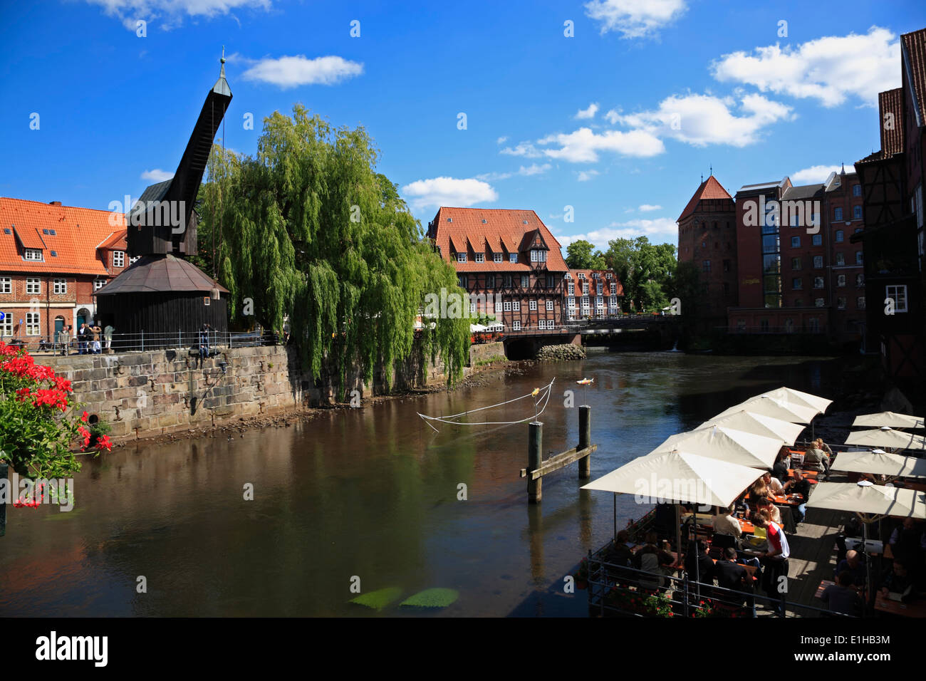 Restaurant and cafe at river Ilmenau in the old harbour at Stintmarkt,  Lueneburg, Lower Saxony, Germany, Europe Stock Photo