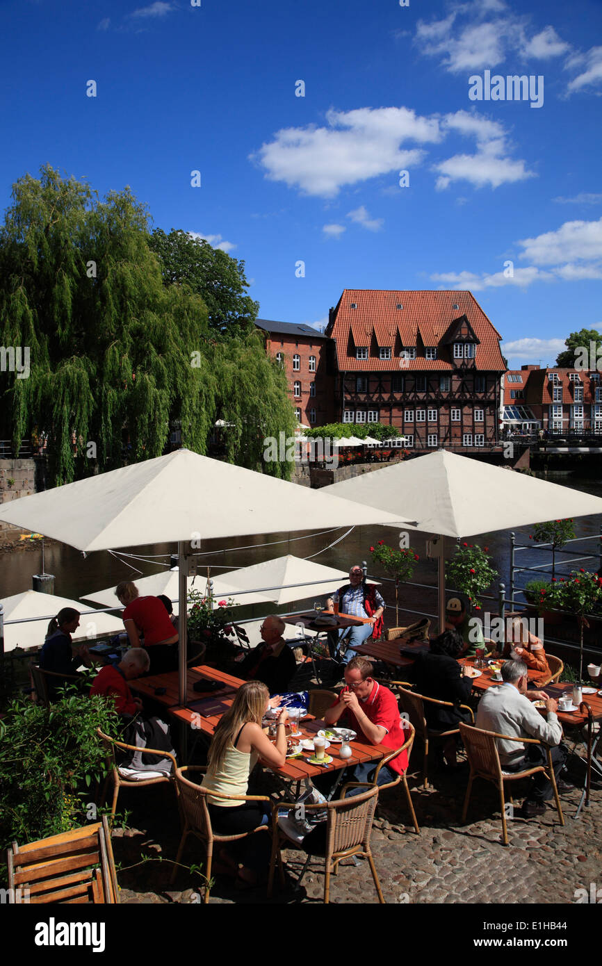 Restaurant and cafe at river Ilmenau in the old harbour at Stintmarkt,  Lueneburg, Lower Saxony, Germany, Europe Stock Photo