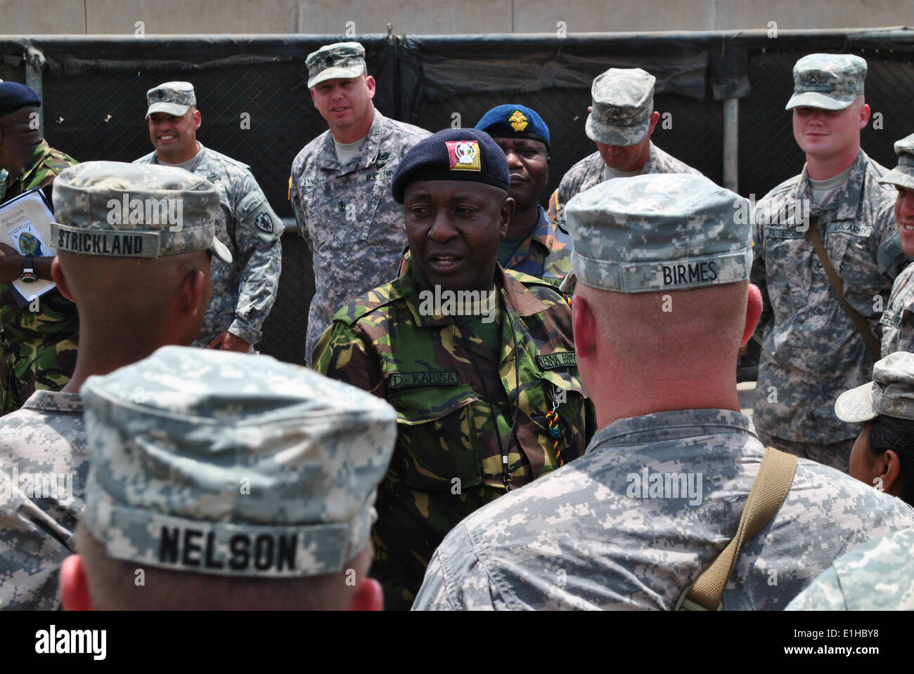 Kenya Army Weapons Training Sgt. Major David Karisa Barisa, center