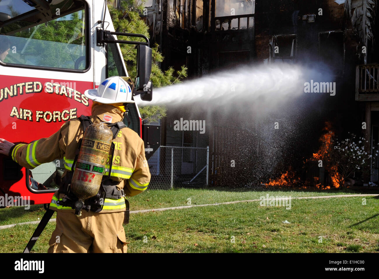 Firefighters from the 11th Civil Engineer Squadron use the bumper