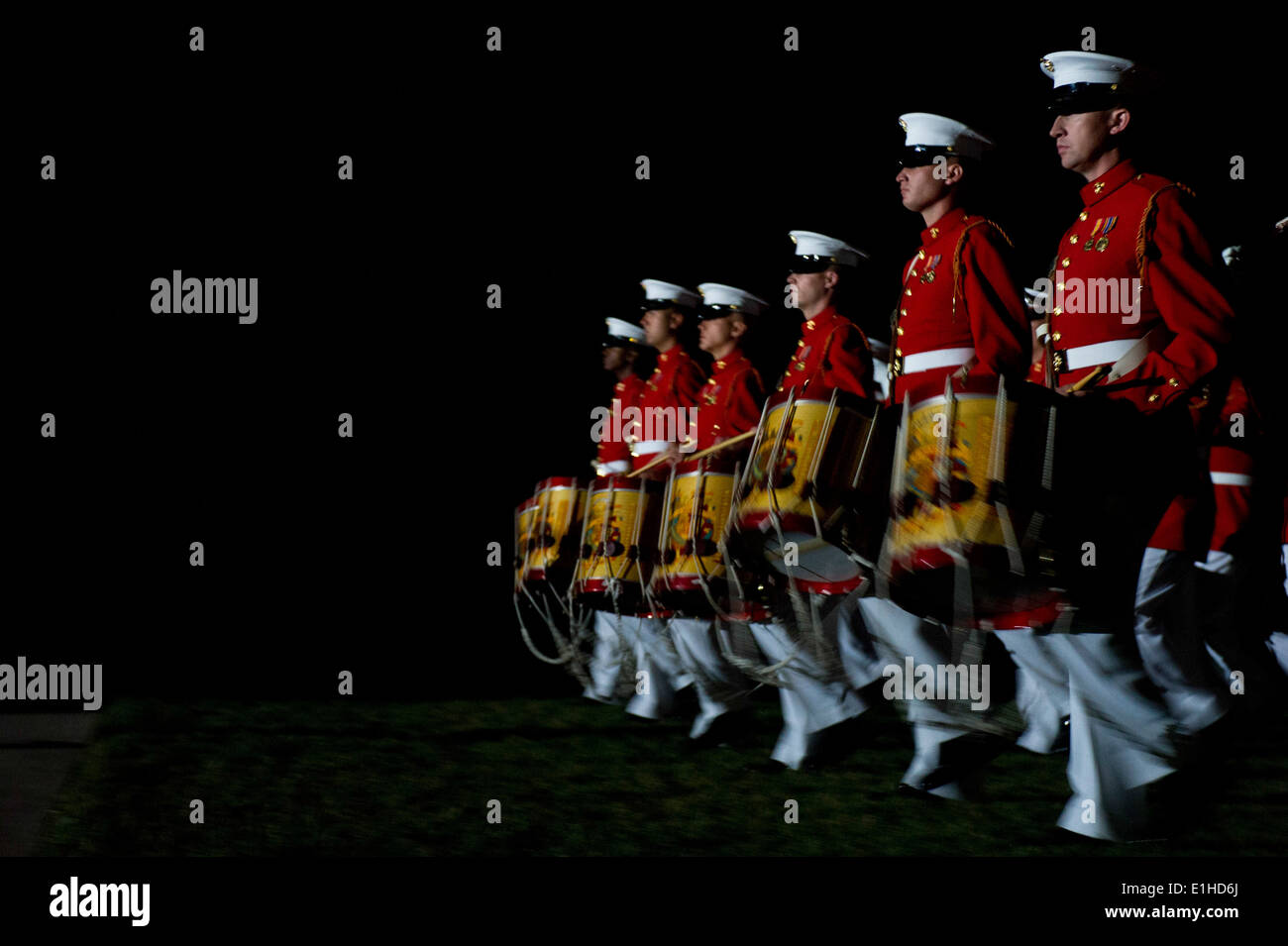 Members of the U.S. Marine Corps Drum and Bugle Corps march during an