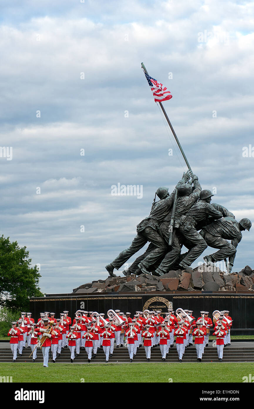 The United States Marine Drum and Bugle Corps marches out during the