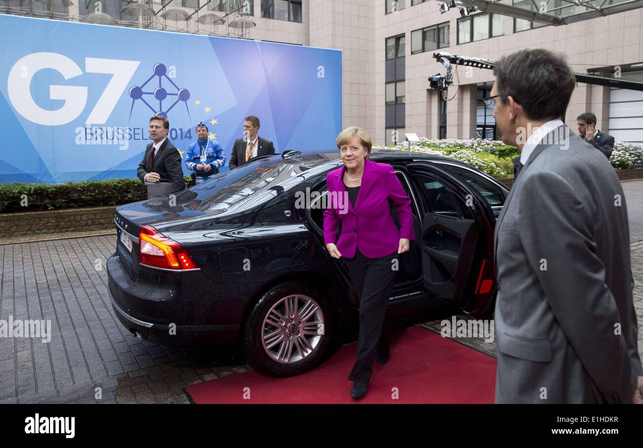 Brussels, Belgium. 4th June, 2014. German Chancellor Angela Merkel (C) arrives for the G7 summit in Brussels, Belgium, June 4, 2014. Credit:  The Council of the European Union/Xinhua/Alamy Live News Stock Photo
