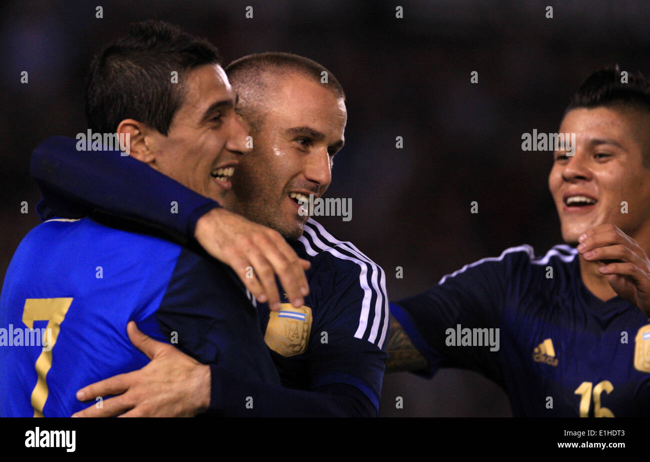 Buenos Aires, Argentina. 4th June, 2014. Argentina's Rodrigo Palacio (C) celebrates after scoring, with his teammates Angel Di Maria (L) and Marcos Rojo (R), during a friendly match against Trinidad and Tobago, prior to the 2014 Brazil FIFA World Cup, held at the Monumental Stadium, in Buenos Aires, Argentina, on June 4, 2014. © Martin Zabala/Xinhua/Alamy Live News Stock Photo