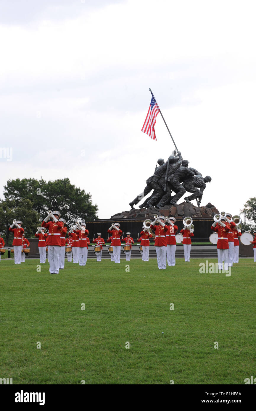 Members of the U.S. Marine Drum and Bugle Corps perform during a Sunset
