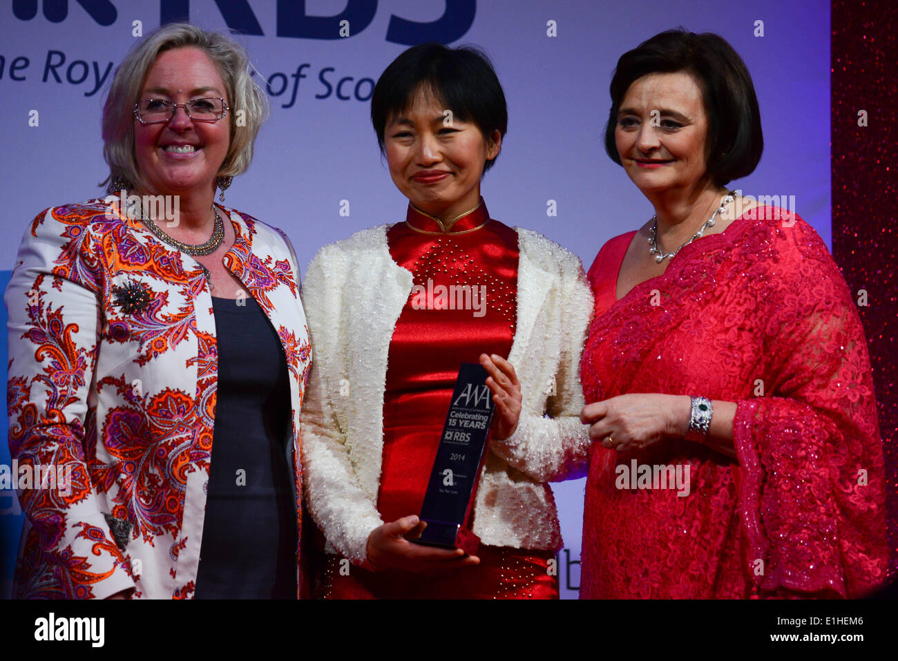 London, UK. 4th June 2014. Cherie Blair present the award to Yee Yee Low for AWA in the Professions at the Asian Women of Achievement Awards 2014 at the London Hilton on Park Lane Hotel. Photo by See li Credit:  See Li/Alamy Live News Stock Photo