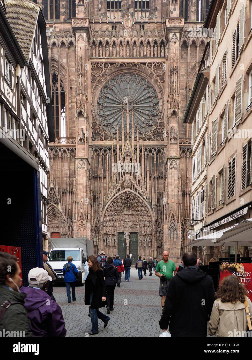 Street Scene Strasbourg France with Notre Dame Cathedral Stock Photo