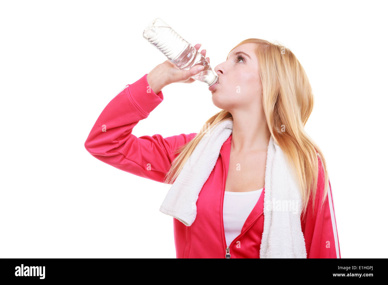 Fitness woman sport girl with towel and water bottle Stock Photo - Alamy