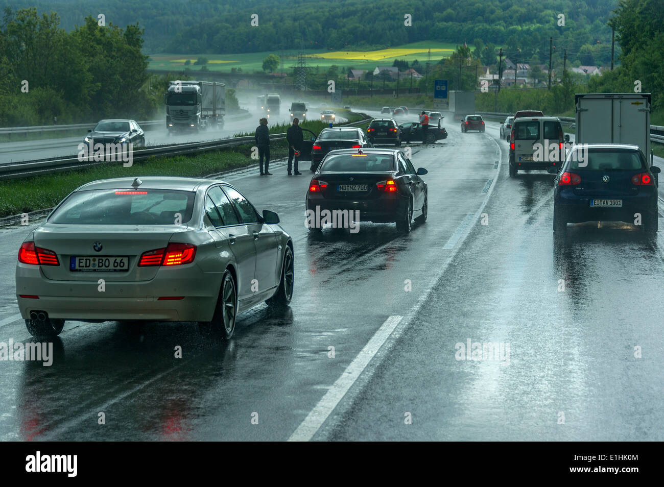 Accident during heavy rain with poor visibility, vehicles diverting to avoid an accident, A9 motorway, near Thalmässing Stock Photo
