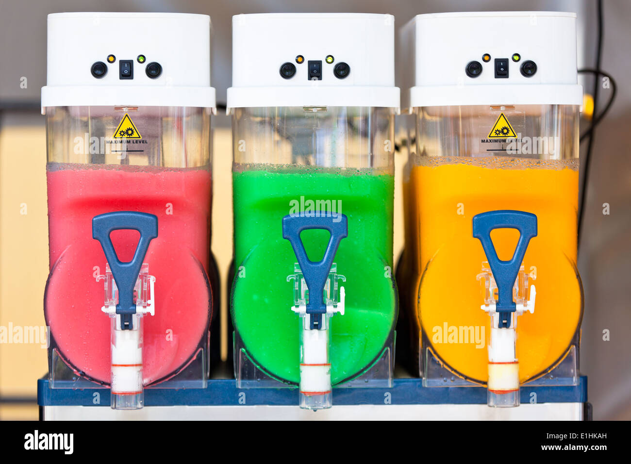https://c8.alamy.com/comp/E1HKAH/crushed-fruit-ice-drink-dispensers-with-color-refreshments-E1HKAH.jpg