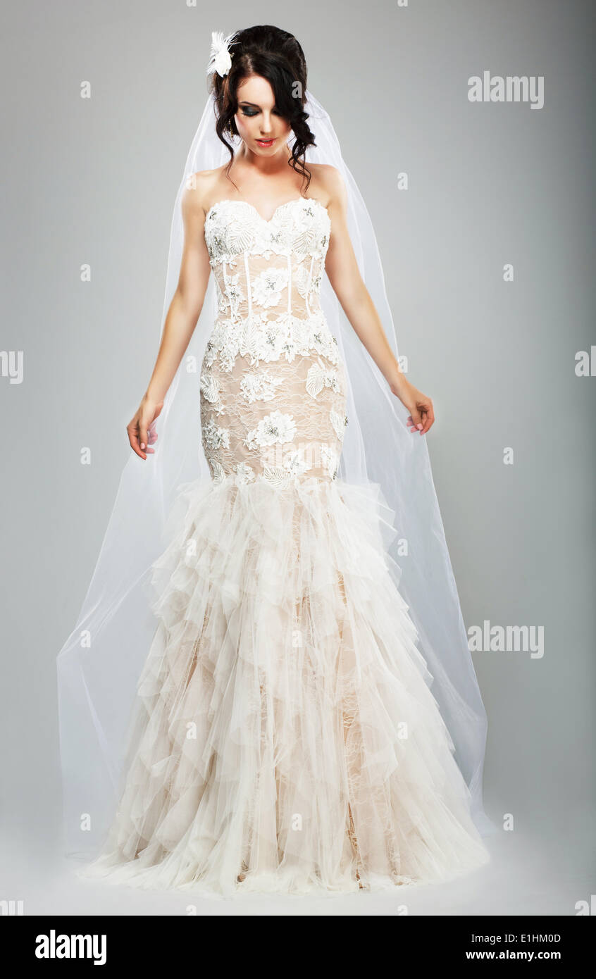 Wedding Style. Elegant Bride in White Long Bridal Dress Stock Photo - Alamy
