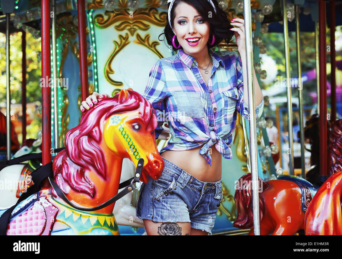 Rejoicing. Merriment. Excited Lively Woman in Funfair Smiling Stock Photo