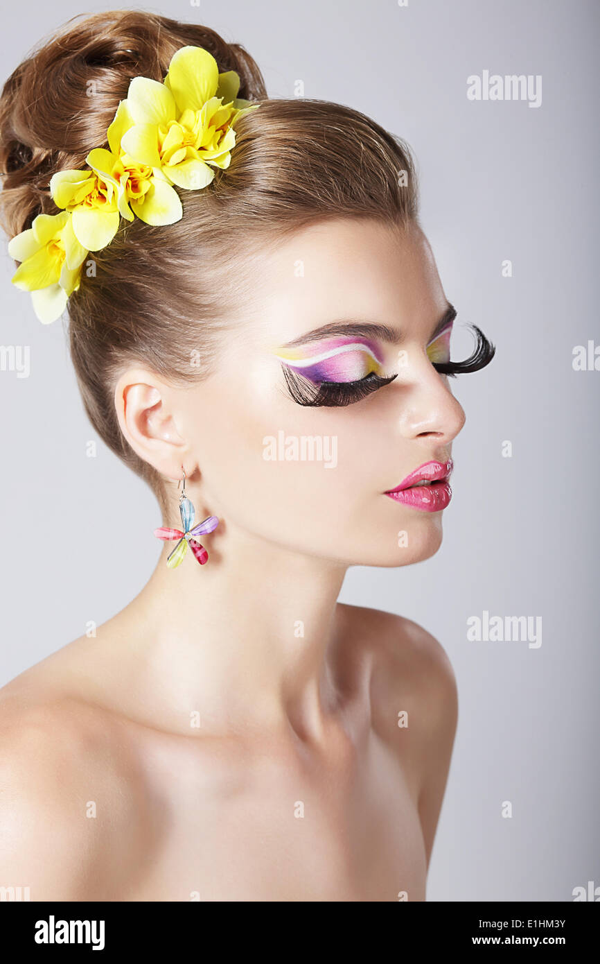 Glam. Profile of Fashionable Woman with Amazing Fantastic Eye Make-up Stock Photo