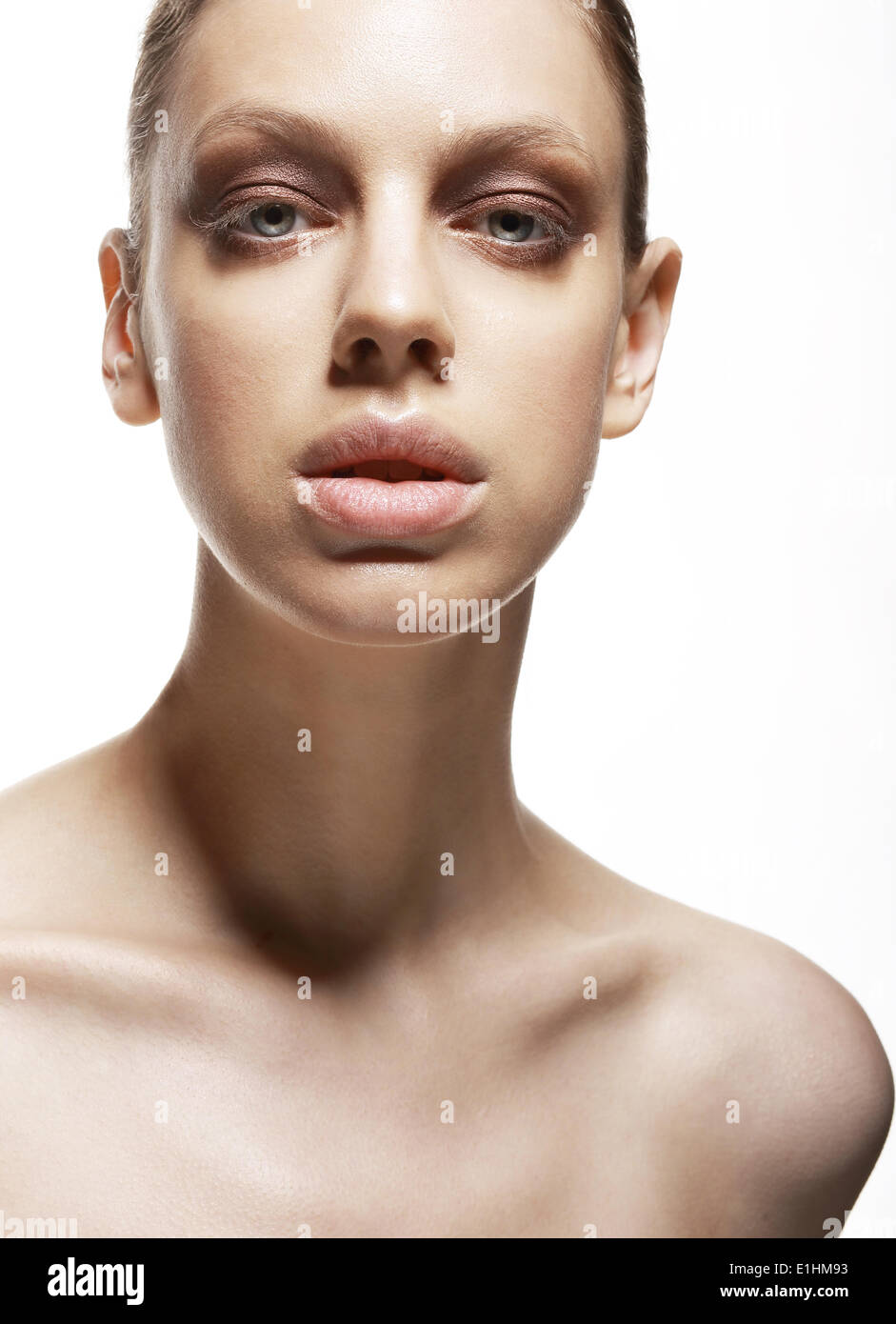 Charm. Fascination. Luxurious Face of Young Woman. Magnetism Stock Photo