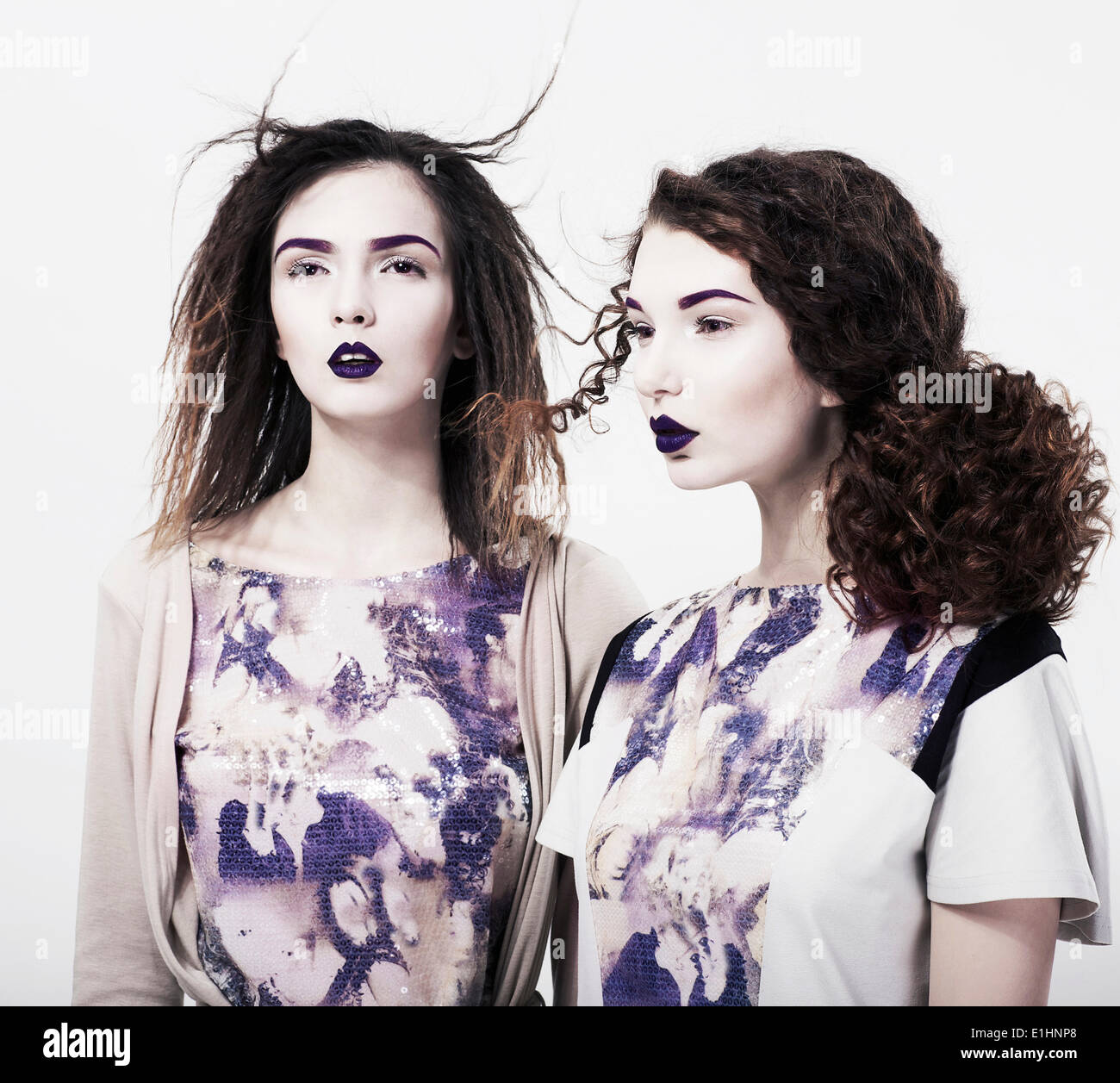Individuality. Emo. Two Glamorous Modern Women. Trendy Brightly Makeup Stock Photo