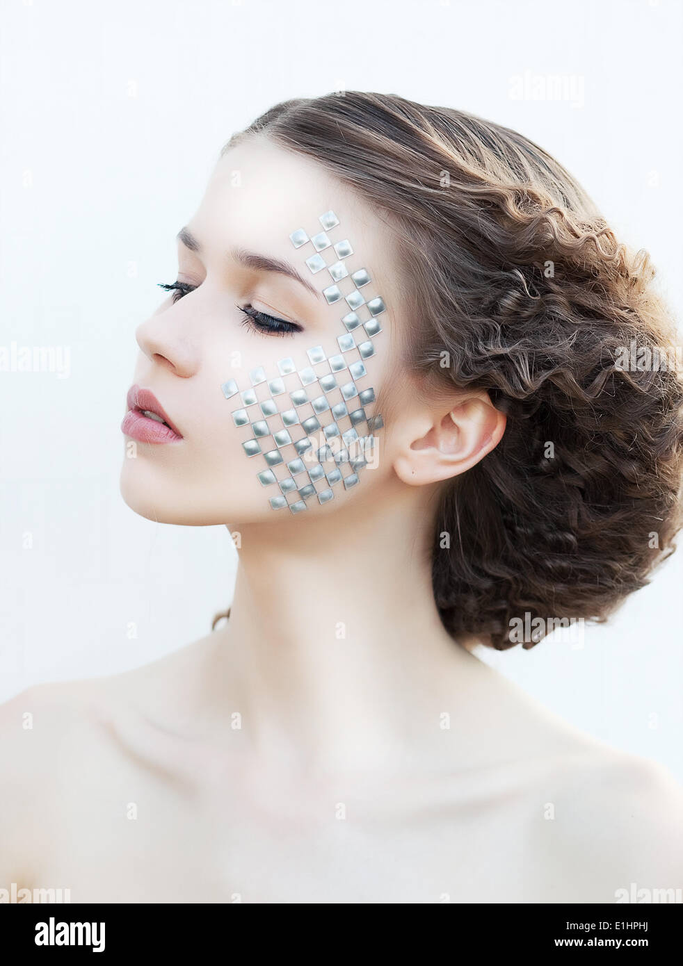 Beautiful young girl face. Perfect skin concept. Art make-up. Natural beauty Stock Photo