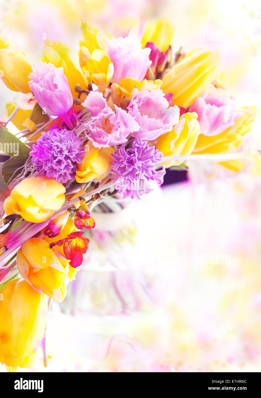 Holiday. Beautiful spring flowers - yellow tulips as festive background Stock Photo