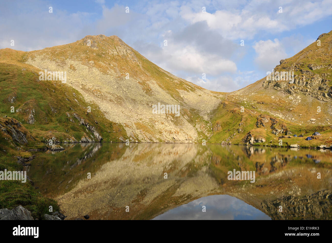 Mountain lake with sky mirror, Romania, Fagaras mountain Stock Photo