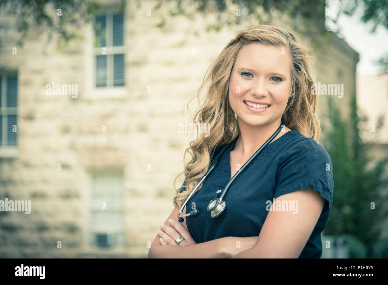 Long haired smiling nurse hi-res stock photography and images - Alamy