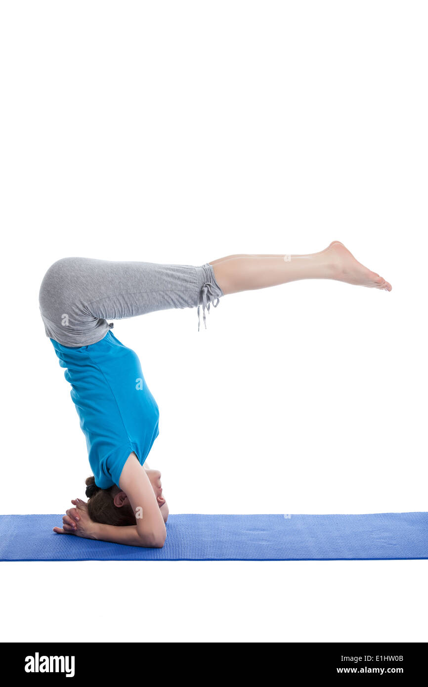 Yoga - young beautiful woman doing yoga asana exercise isolated Stock Photo
