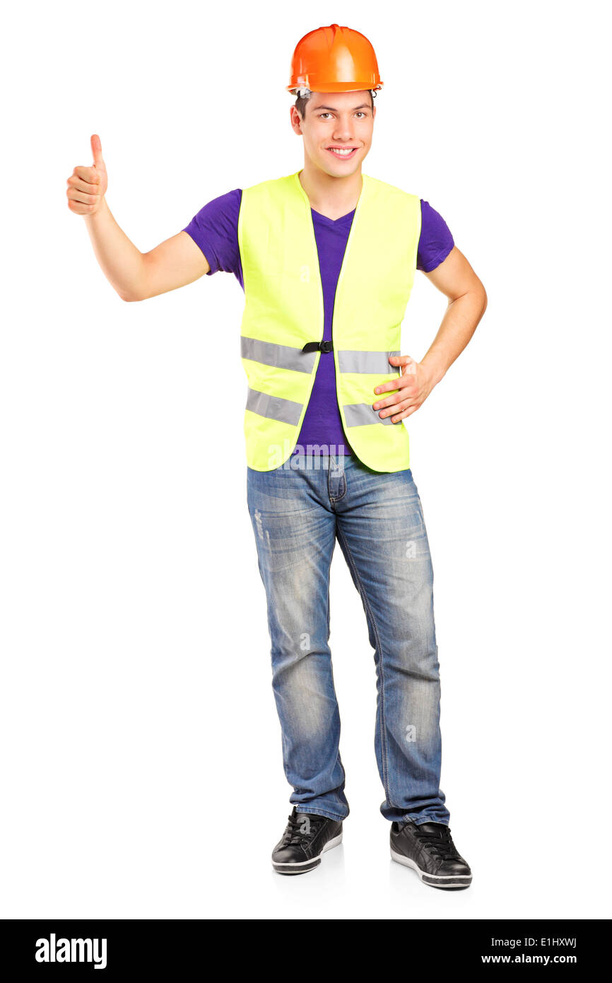 Full length portrait of a male construction worker giving a thumb up ...