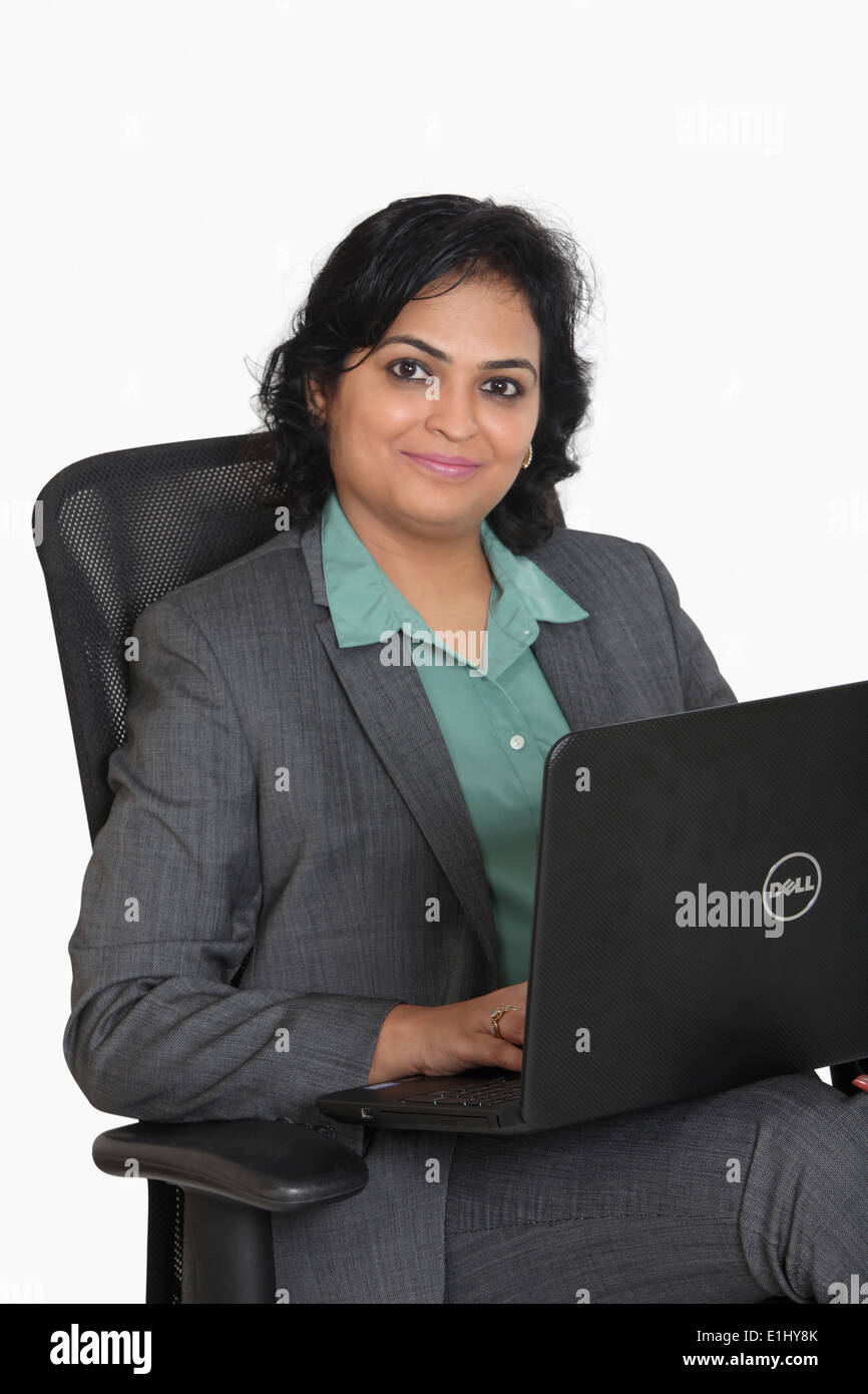 Lady working on a laptop, Pune, India Stock Photo