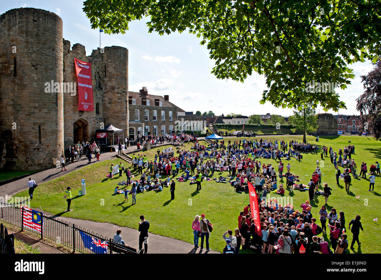 Tonbridge, Kent, UK. 5th June, 2014. . 05th June, 2014. Children from local schools gather in front of Tonbridge Castle following the arrival of the Commonwealth Games Queen's Baton. The event was attended by children from local schools who participated in a variety of activities organised by Tonbridge and Malling Council. Credit:  patrick nairne/Alamy Live News Stock Photo