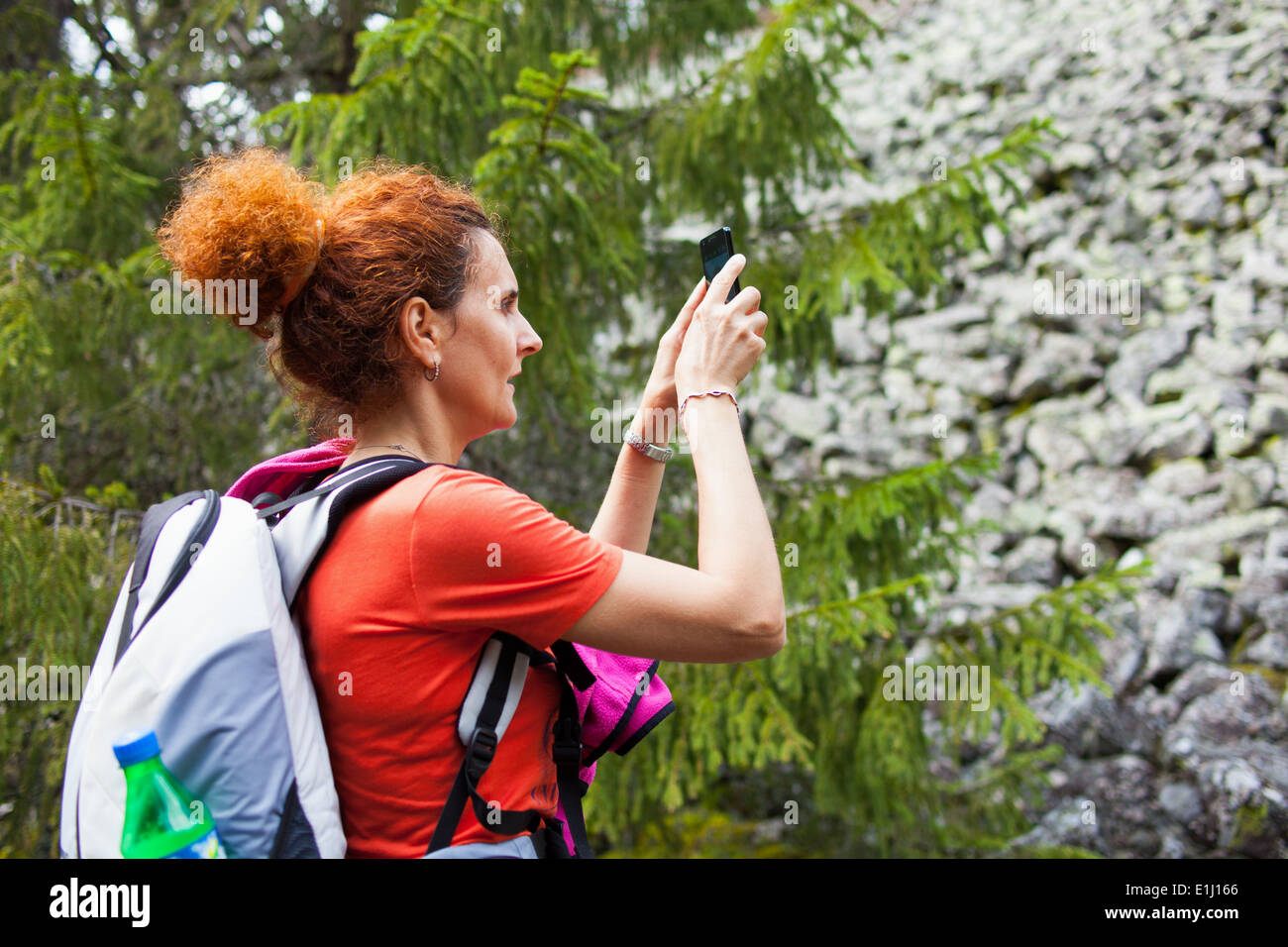 Back view woman taking photos hi-res stock photography and images - Alamy