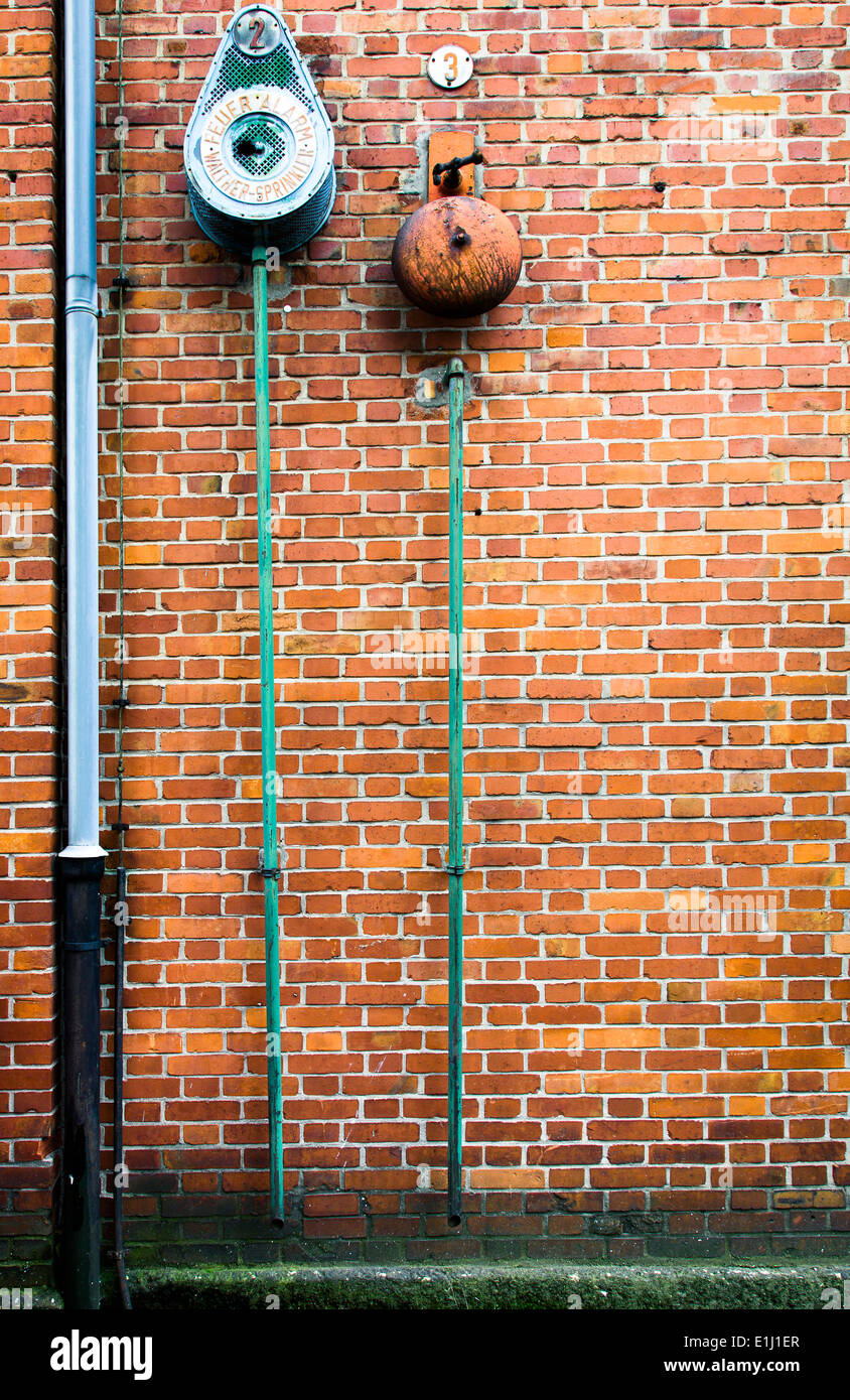 Visual Reference: Alarm System In Front Of Facade Of An Old Factory