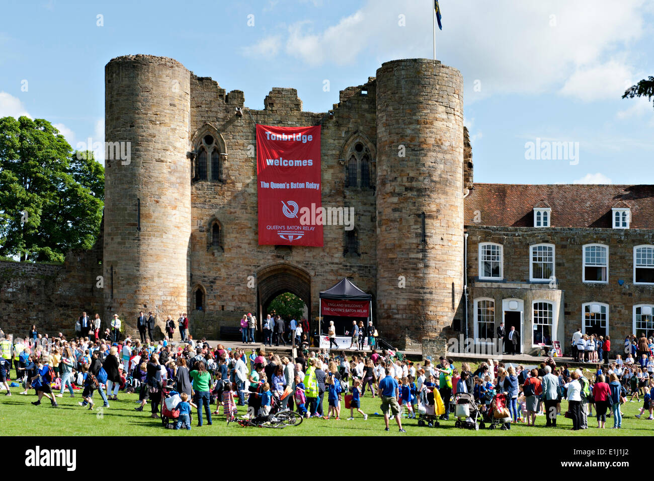Tonbridge, Kent, UK. 5th June, 2014. . 05th June, 2014. Children from local schools gather in front of Tonbridge Castle following the arrival of the Commonwealth Games Queen's Baton. The event was attended by children from local schools who participated in a variety of activities organised by Tonbridge and Malling Council. Credit:  patrick nairne/Alamy Live News Stock Photo