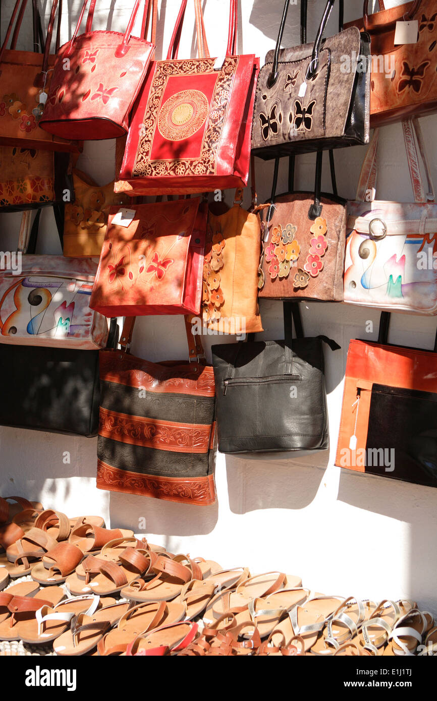 Leather bags in shop, Rhodes Island, Lindos Greece Stock Photo - Alamy