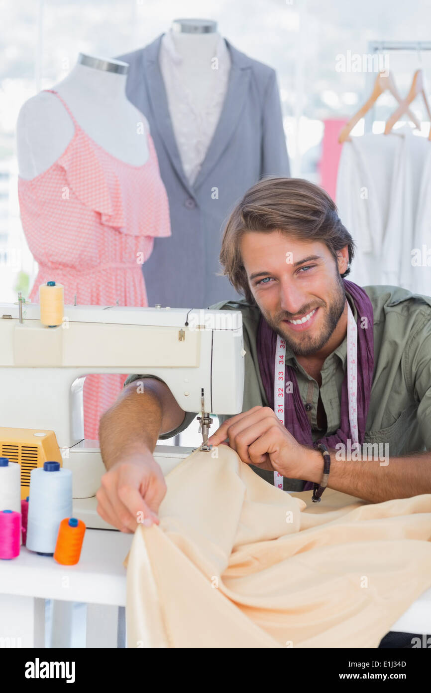 Fashion designer sewing Stock Photo Alamy