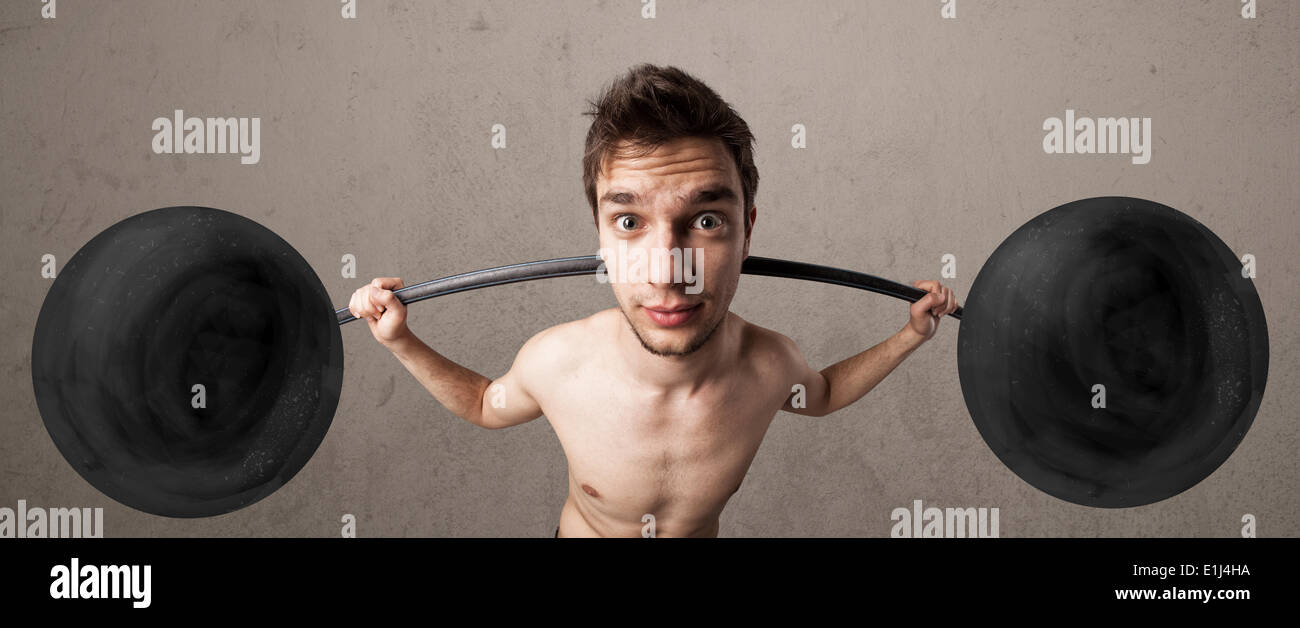 Funny skinny guy lifting weights Stock Photo Alamy