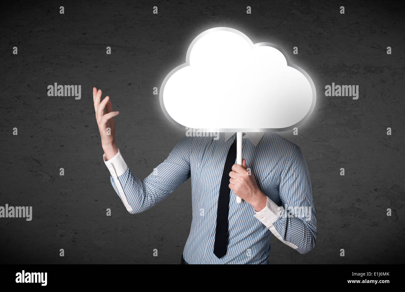 Businessman holding a cloud Stock Photo - Alamy