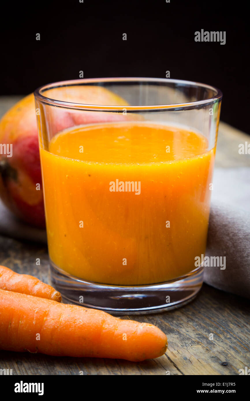 Glass of mango carrot smoothie, carrots and mango Stock Photo Alamy