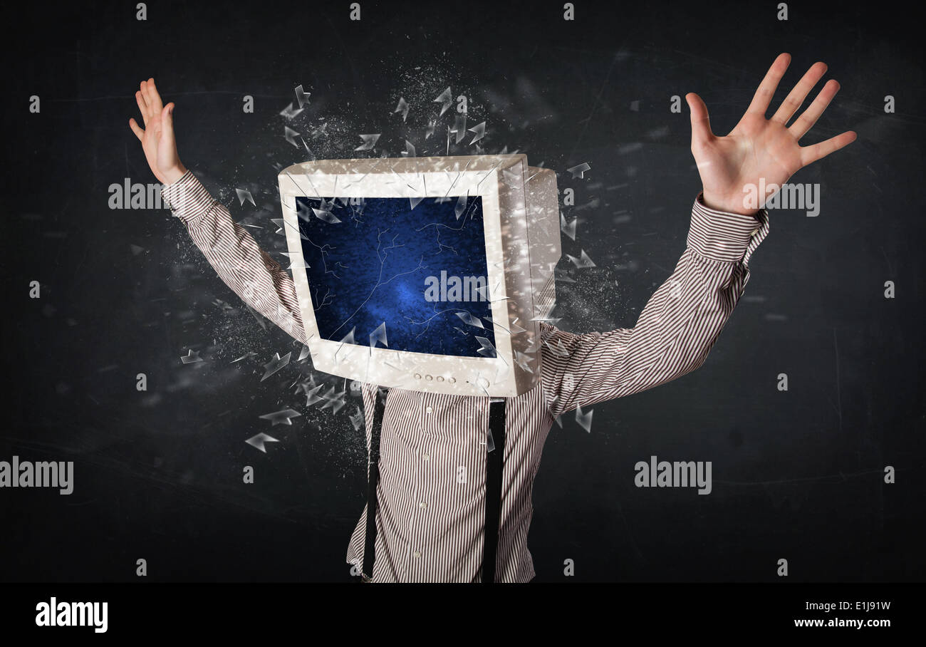Computer monitor screen exploding on a young persons head Stock Photo ...