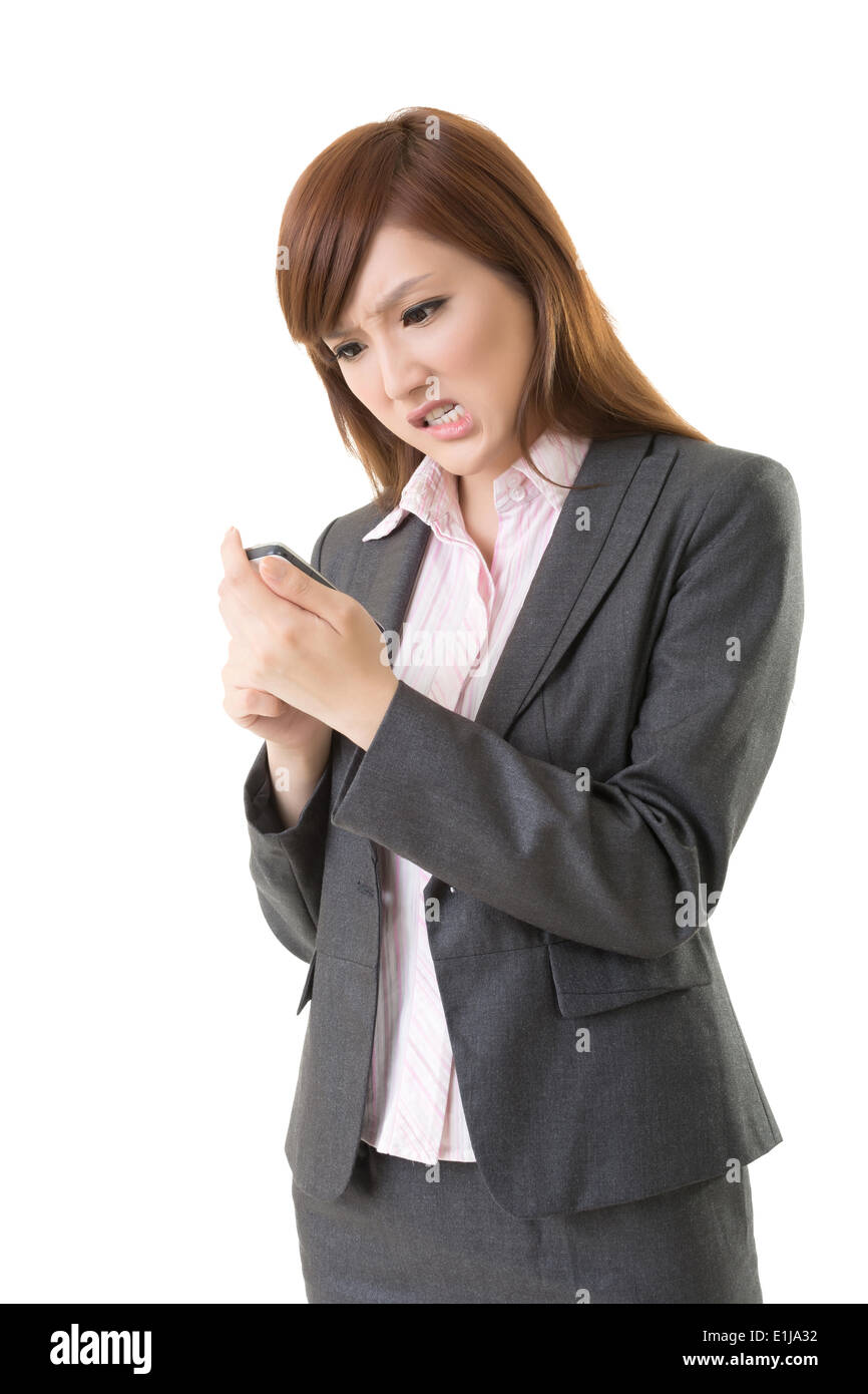 Angry businesswoman talk on phone Stock Photo