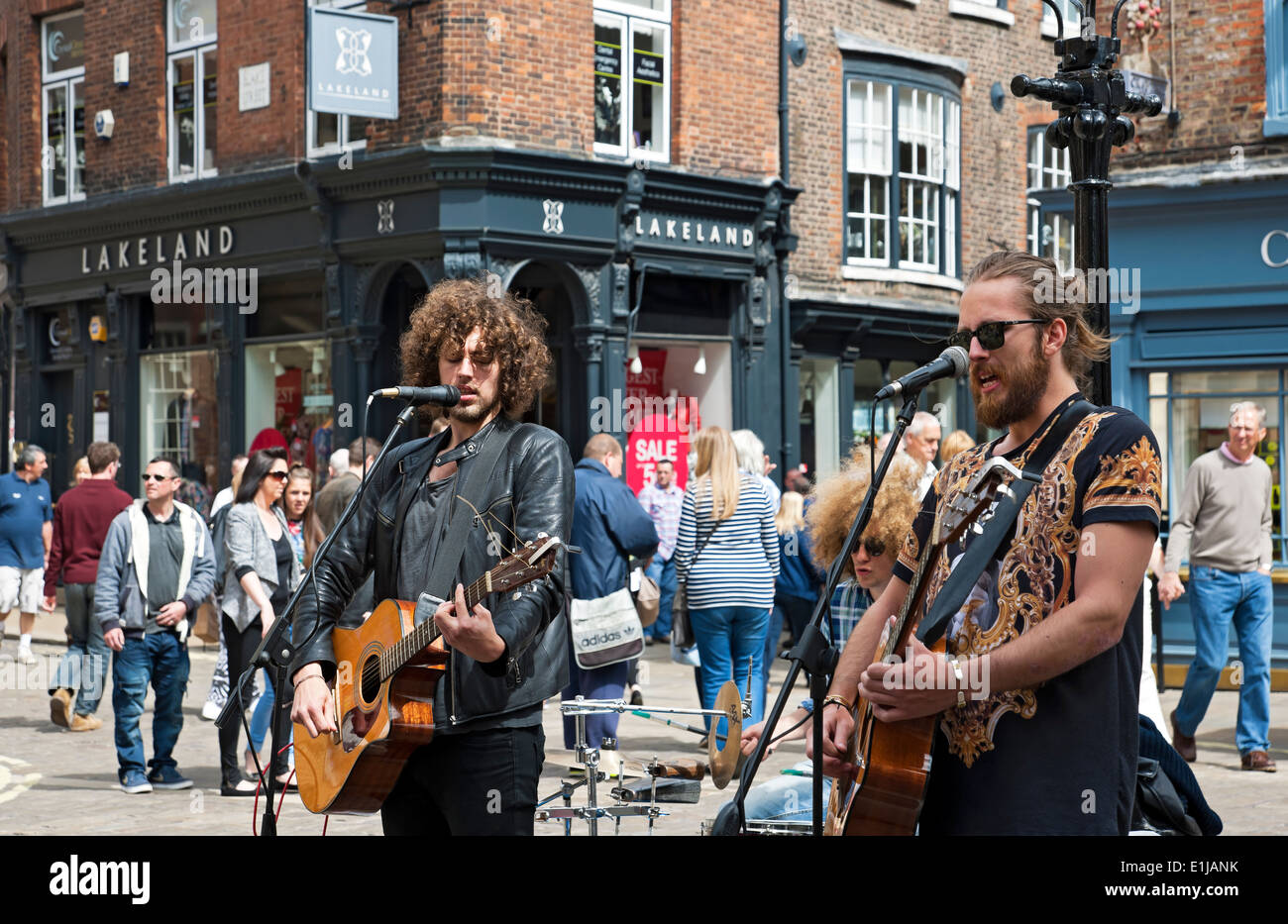 Young men busking hires stock photography and images Alamy