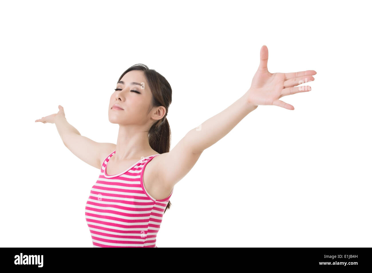 Asian woman stretch arms and feel free Stock Photo