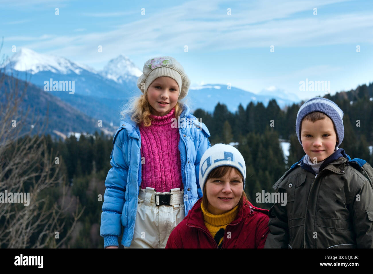 Family and winter mountain landscape Stock Photo